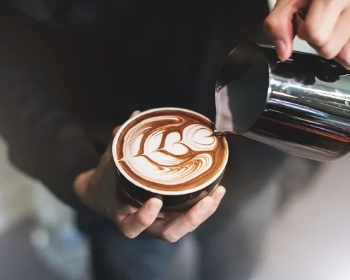 Barista making cappuccino